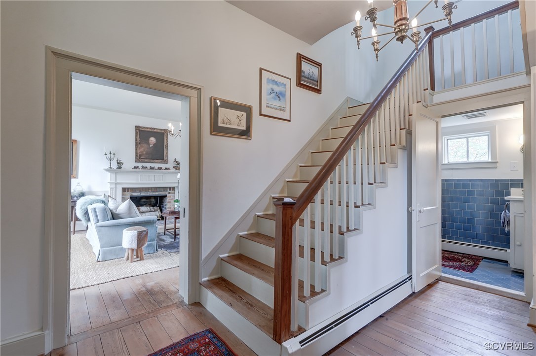 23390 Mt Cloud Road Bowling Green, VA 22427 - Photo 10 of 50 a view of a hallway with wooden floor and staircase