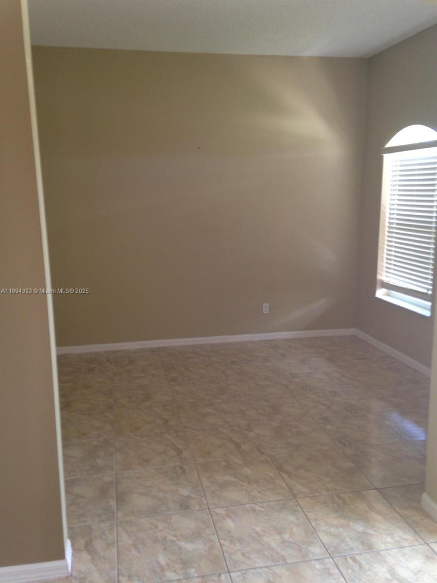 4634 Southwest Eagle Street Port St. Lucie, FL 34953 - Photo 15 of 16 a view of empty room