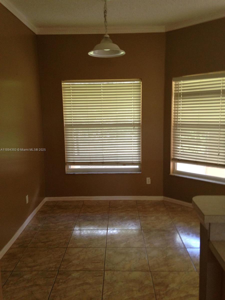 4634 Southwest Eagle Street Port St. Lucie, FL 34953 - Photo 7 of 16 a view of livingroom with window