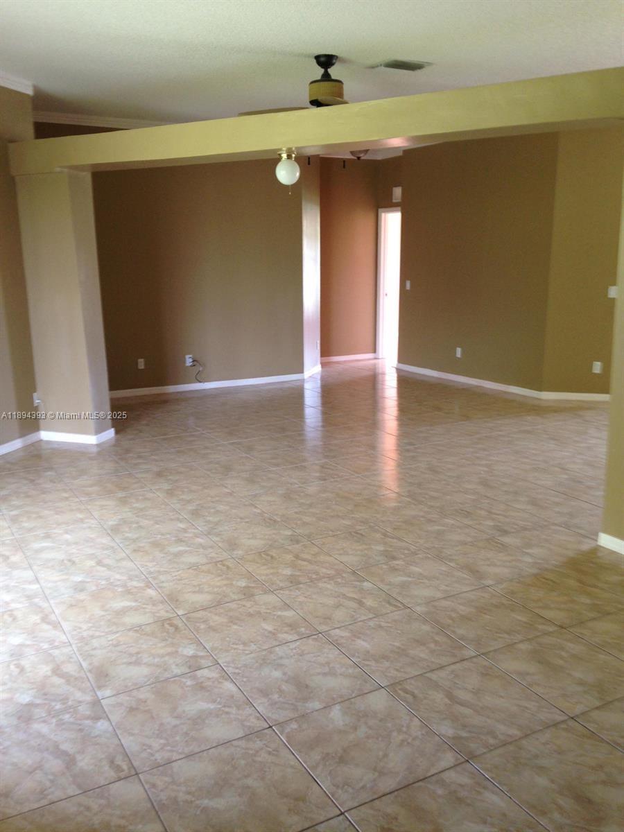 4634 Southwest Eagle Street Port St. Lucie, FL 34953 - Photo 8 of 16 a view of a room with an empty space
