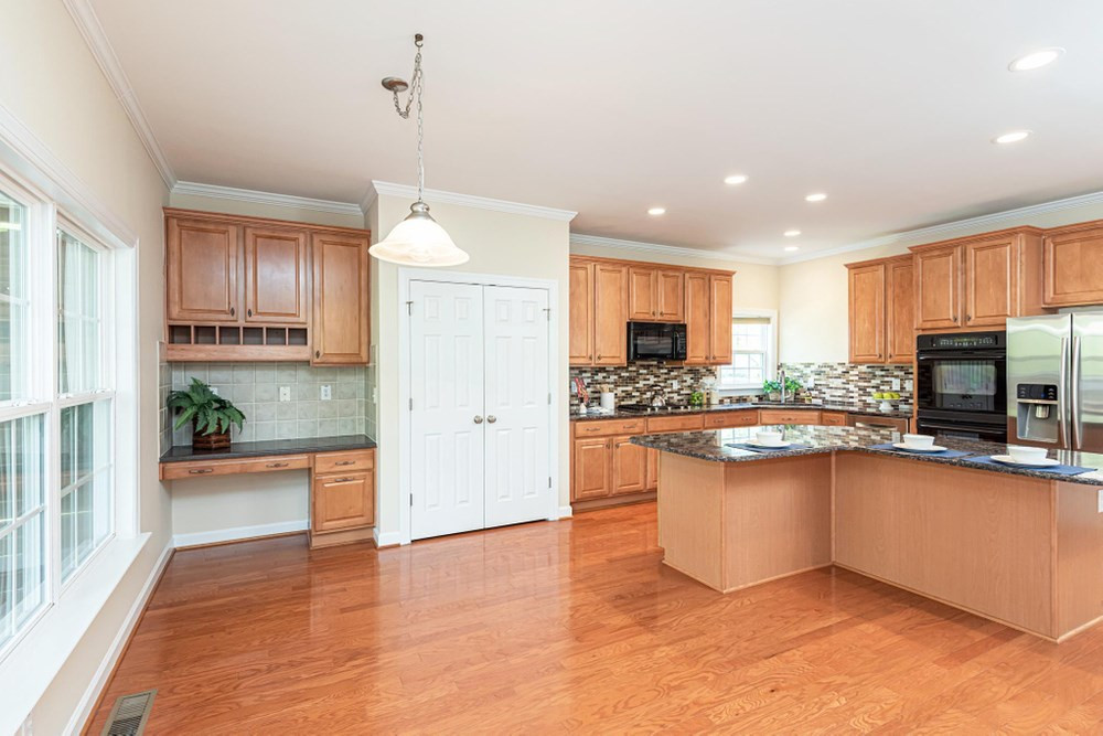 3105 Hummer Way Raleigh, NC 27614 - Photo 6 of 30 View of Breakfast Nook looking into the kitchen. Double doors are to the pantry. Kitchen