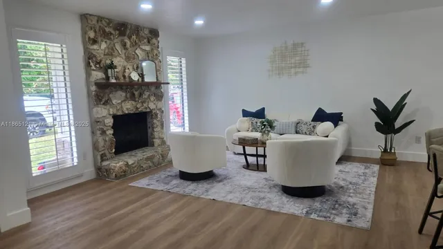 a bathroom with a toilet a sink and shower