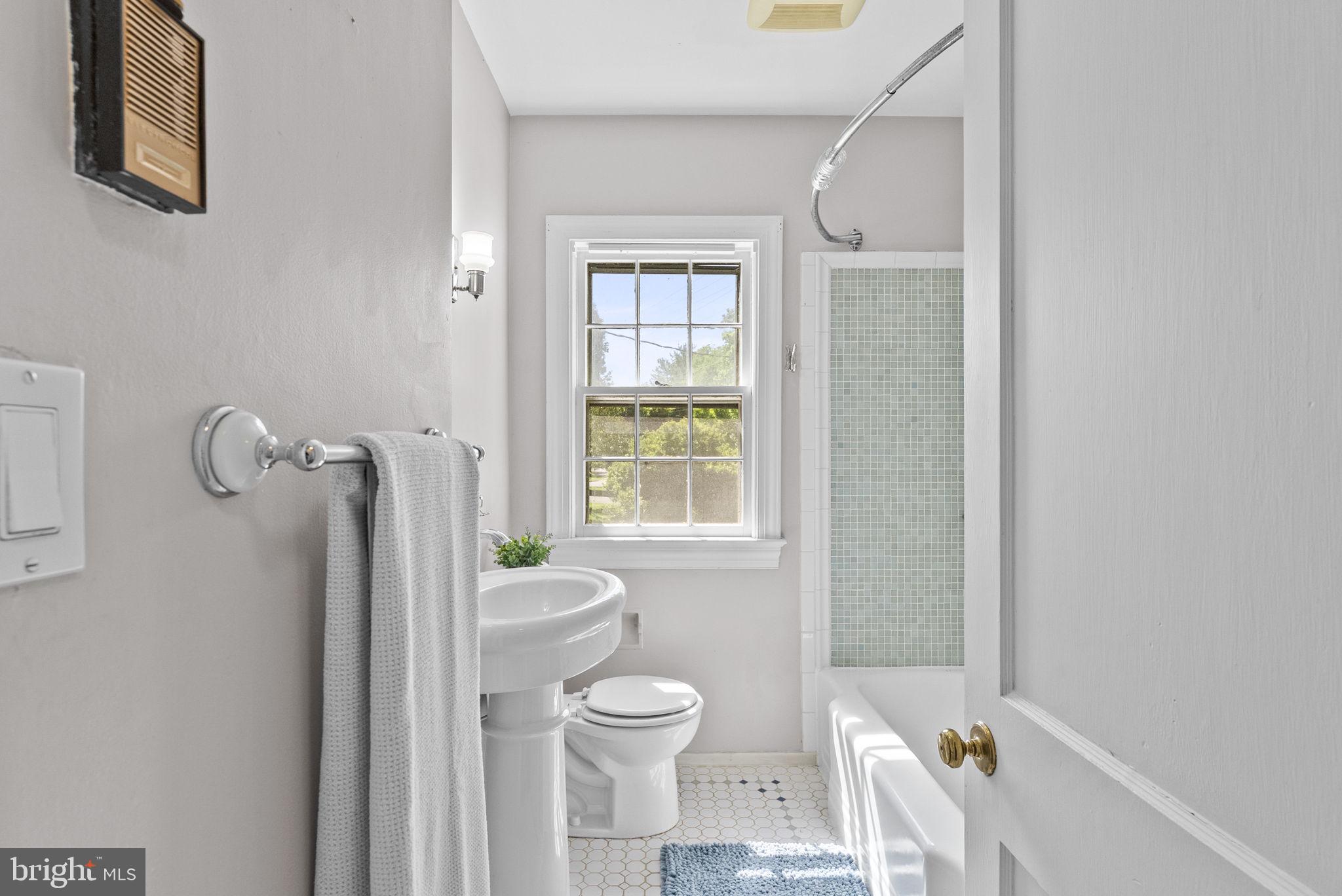539 Old Meetze Road Warrenton, VA 20186 - Photo 14 of 30 a bathroom with a toilet and a shower