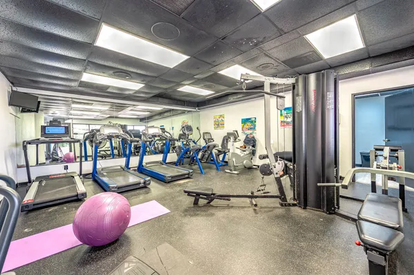 a view of a room with gym equipment