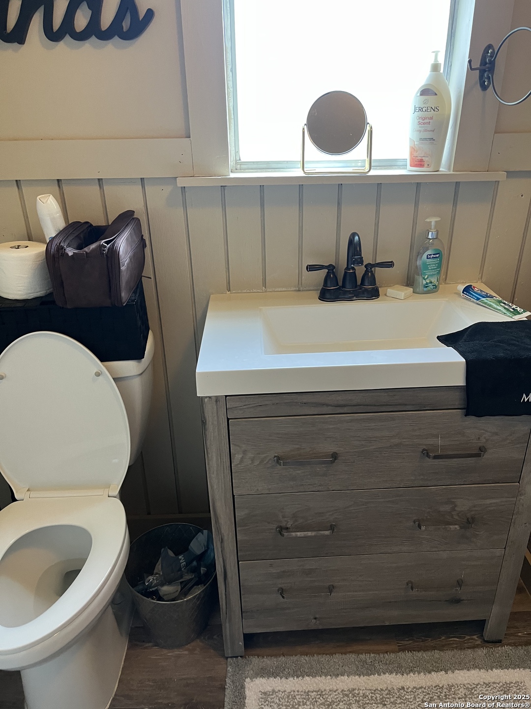 4664 Rocky Road Blanco, TX 78606 - Photo 9 of 27 a bathroom with a toilet and a sink