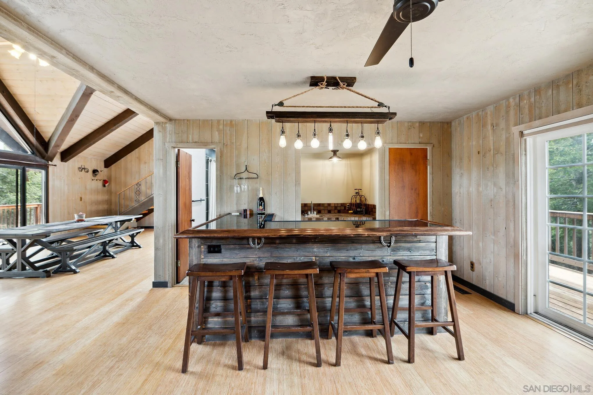 29026 Deer Creek Trail Pine Valley, CA 91962 - Photo 15 of 37 a kitchen with a table and chairs in it
