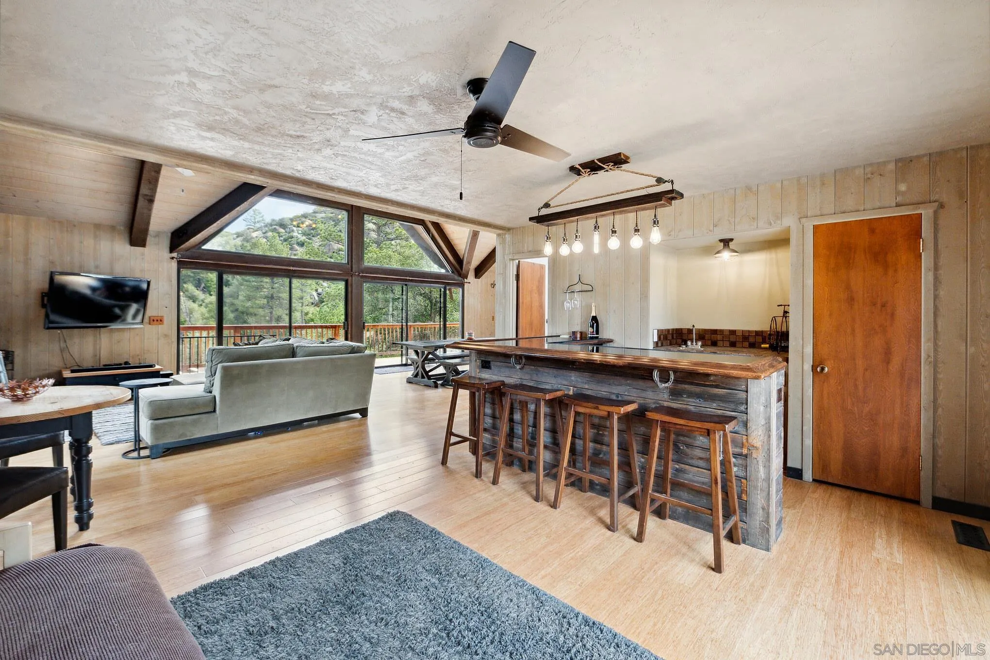 29026 Deer Creek Trail Pine Valley, CA 91962 - Photo 16 of 37 a very nice looking living room with a large window and a wooden floor