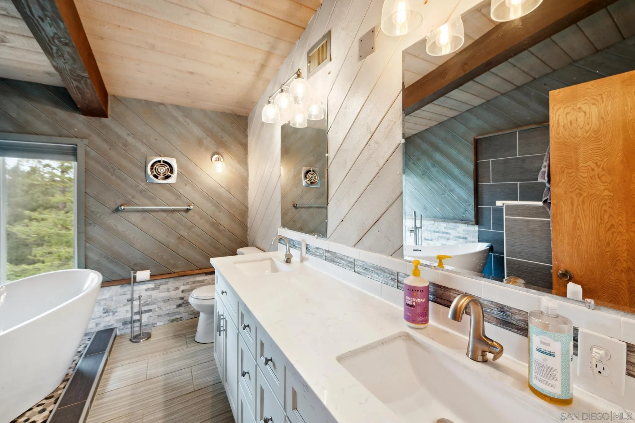 29026 Deer Creek Trail Pine Valley, CA 91962 - Photo 31 of 37 a bathroom with a sink a vanity and a bathtub
