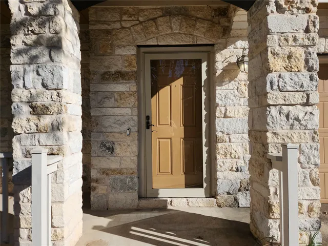 a front view of a house with a shower
