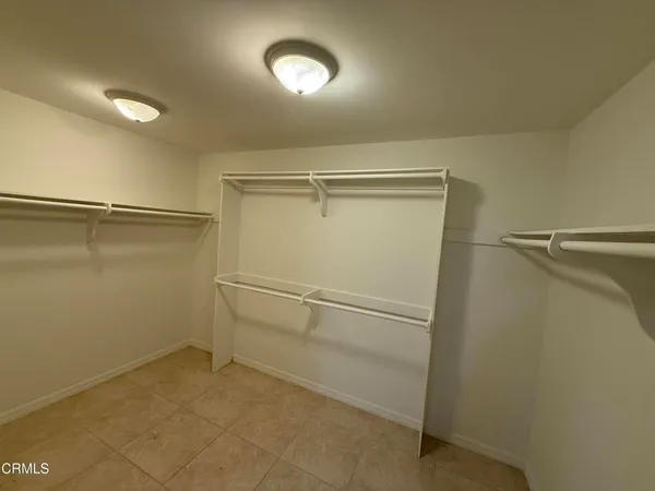 a view of an empty walk in closet