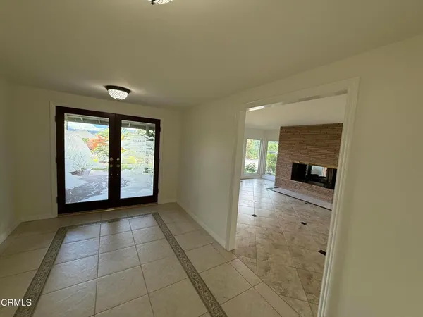 an empty room with a sliding door
