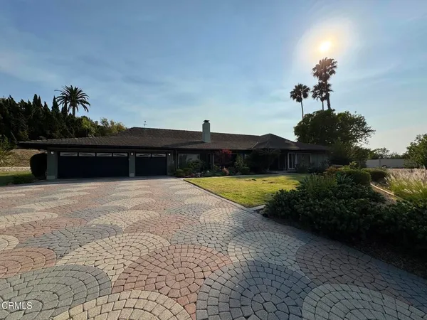 a view of a terrace with a garden
