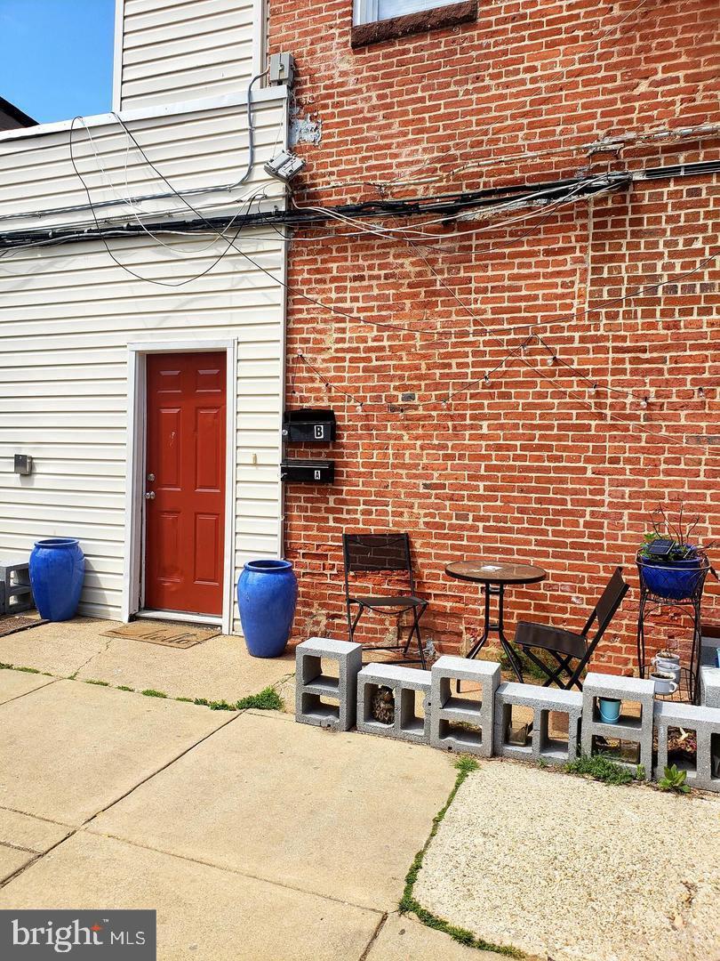445 East Fort Avenue, Unit A Baltimore, MD 21230 - Photo 1 of 18 a building outdoor space with patio