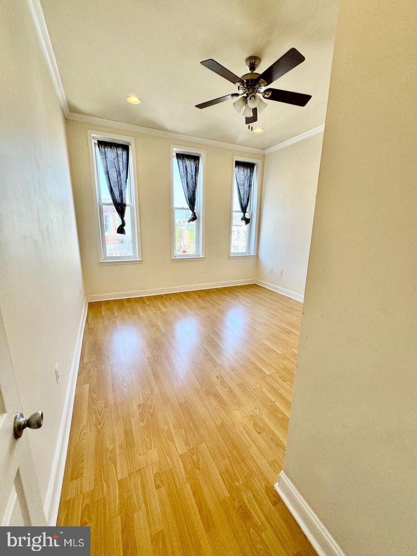 445 East Fort Avenue, Unit A Baltimore, MD 21230 - Photo 12 of 18 a view of livingroom with wooden floor