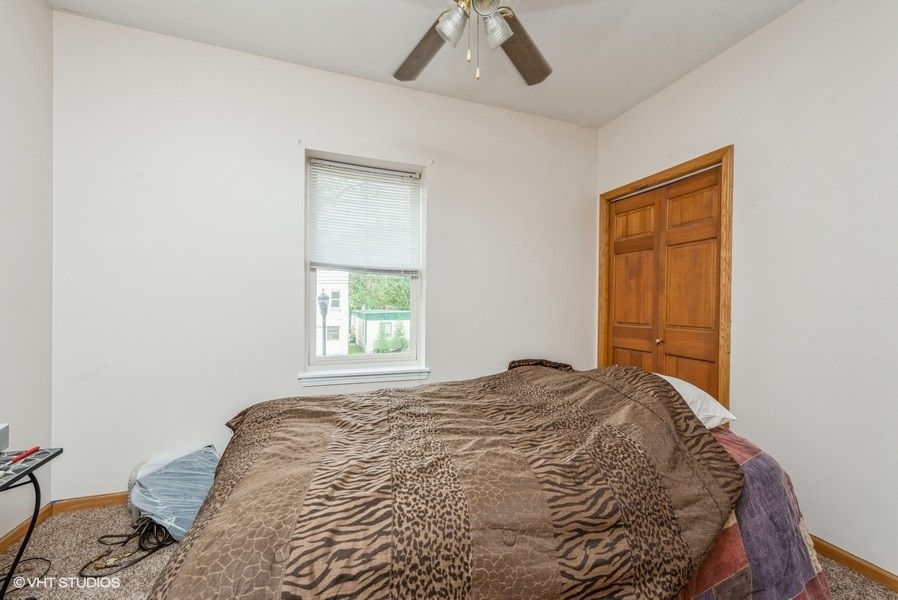 14-n043 Reinking Road Hampshire, IL 60140 - Photo 7 of 12 a bedroom with a bed and a window