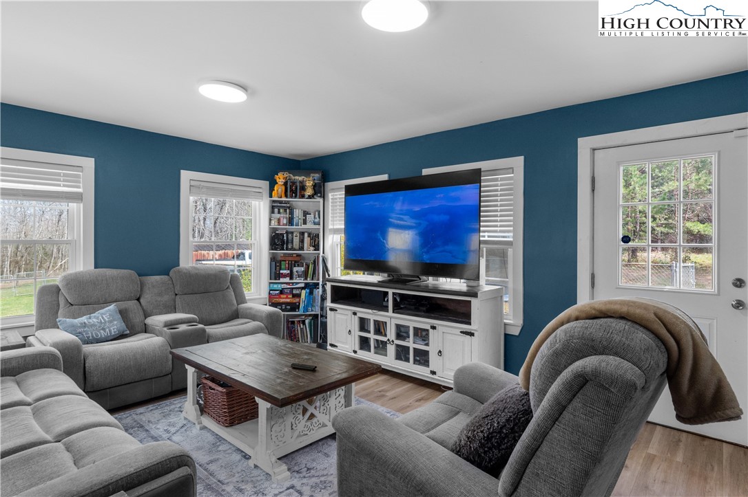 379 Pat Nixon Road State Road, NC 28676 - Photo 16 of 41 a living room with furniture and a flat screen tv