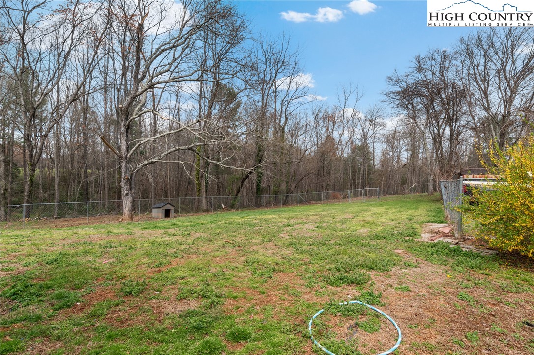 379 Pat Nixon Road State Road, NC 28676 - Photo 35 of 41 a backyard of a house with lots of green space