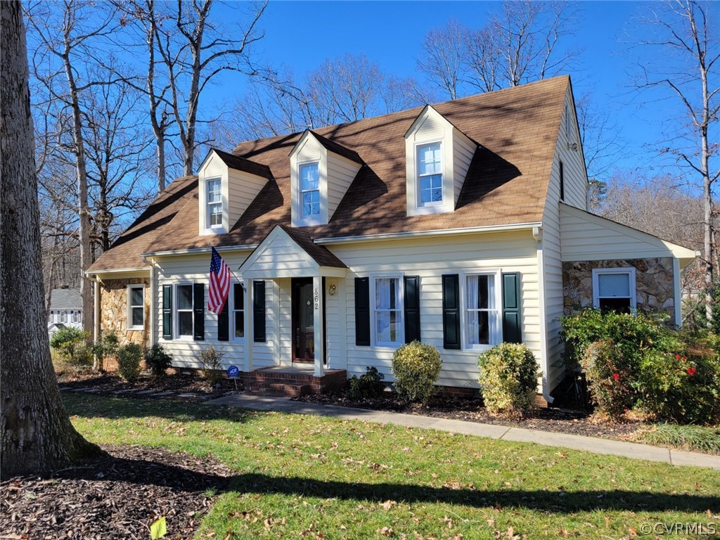 front view of a house with a yard