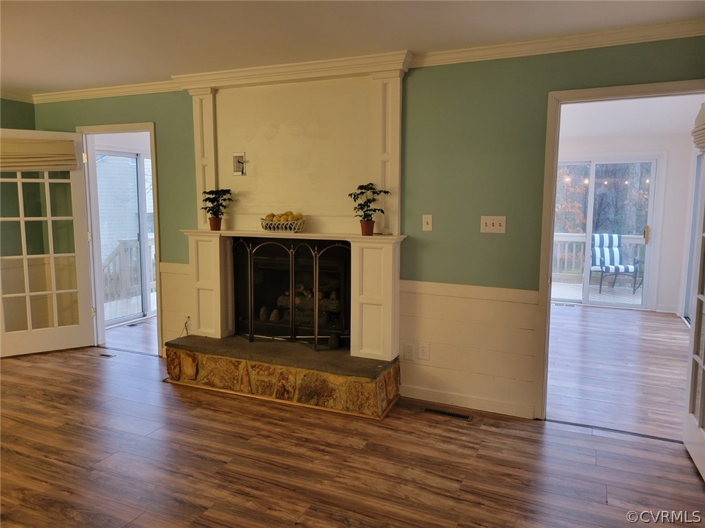 862 Watch Hill Road Midlothian, VA 23114 - Photo 13 of 30 a view of a livingroom with wooden floor and a fireplace