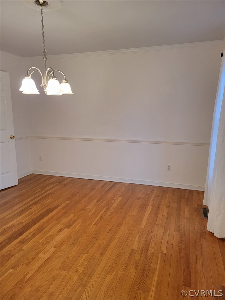 862 Watch Hill Road Midlothian, VA 23114 - Photo 22 of 30 a view of a room with wooden floor and a ceiling fan