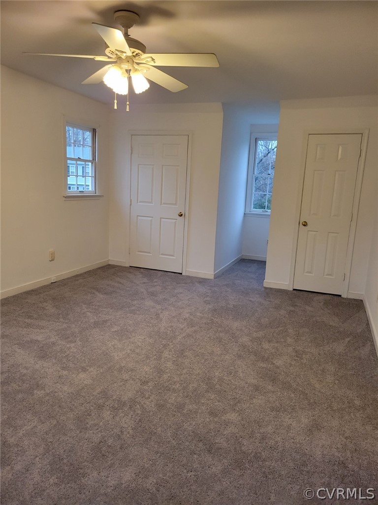 862 Watch Hill Road Midlothian, VA 23114 - Photo 26 of 30 an empty room with windows and fan