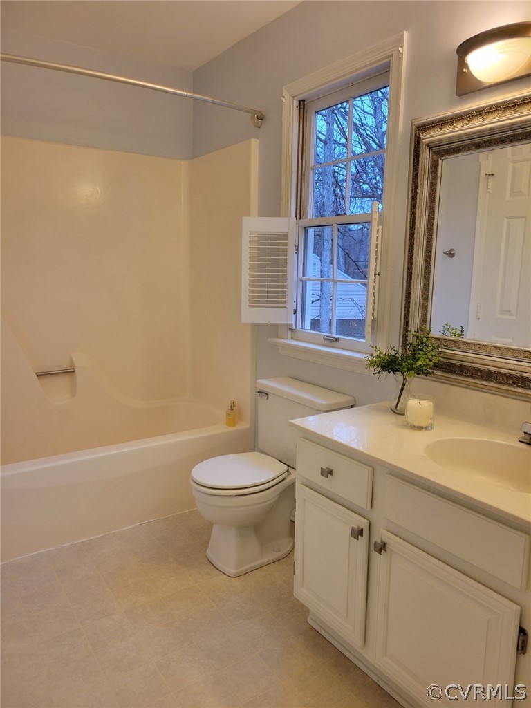 862 Watch Hill Road Midlothian, VA 23114 - Photo 27 of 30 a bathroom with a granite countertop sink a toilet and a shower