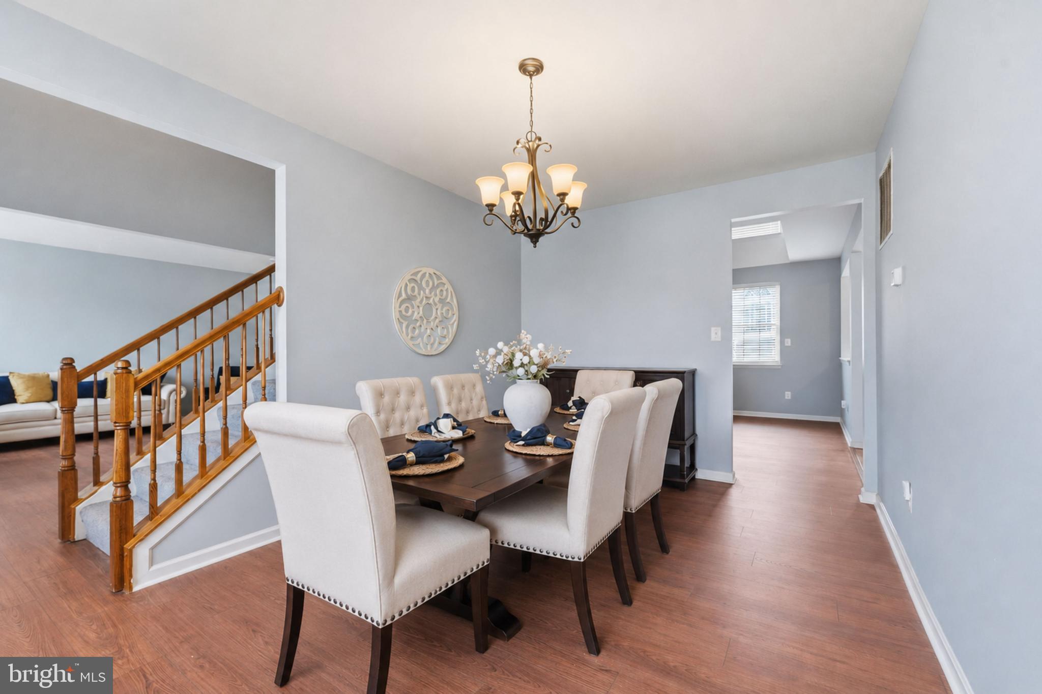 24 Overbrook Road Ranson, WV 25438 - Photo 3 of 21 a view of a dining room with furniture and a chandelier
