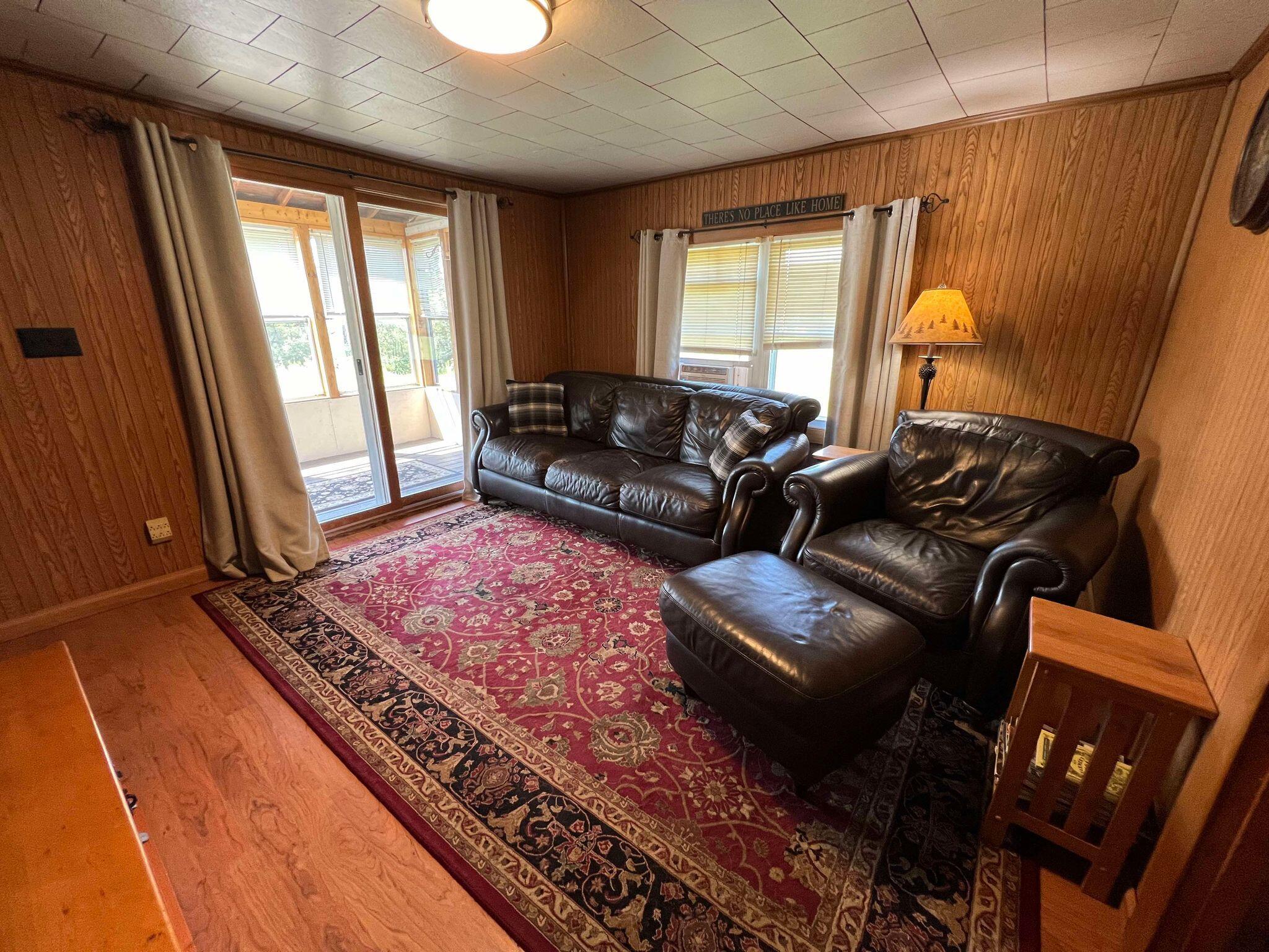 79 Woodland Road Caribou, ME 04736 - Photo 15 of 43 Living Room w/ door to enclosed porch