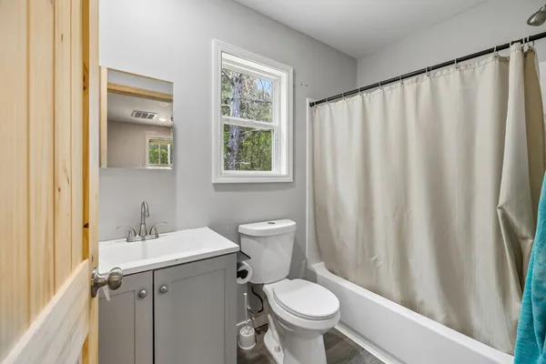 a kitchen with stainless steel appliances a refrigerator sink and cabinets