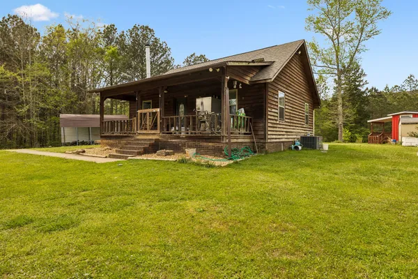 front view of a house with a yard