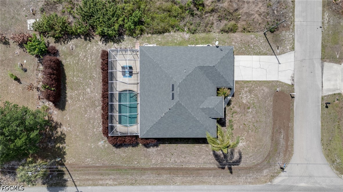 3801 28th Street Southwest Lehigh Acres, FL 33976 - Photo 27 of 37 an aerial view of a house with a backyard space