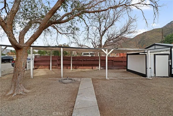 a house with trees in front of it