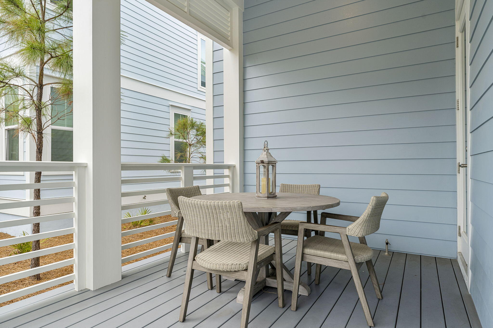 113 Siasconset Ln Inlet Beach Inlet Beach, FL 32461 - Photo 14 of 56 a view of a house with a table and chairs