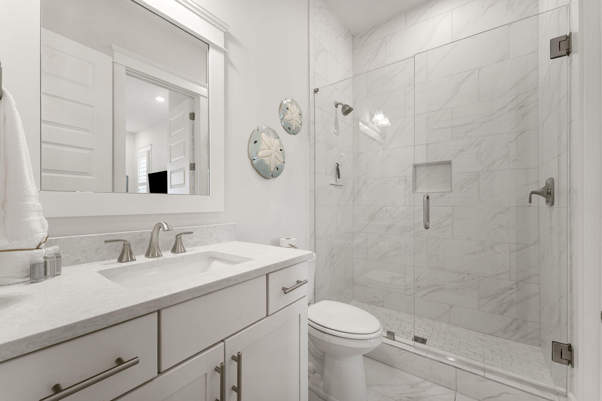 113 Siasconset Ln Inlet Beach Inlet Beach, FL 32461 - Photo 27 of 56 a bathroom with a sink a toilet and shower