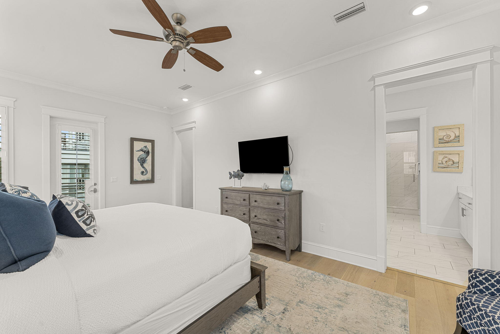 113 Siasconset Ln Inlet Beach Inlet Beach, FL 32461 - Photo 36 of 56 a bedroom with a bed a flat screen tv and a dresser