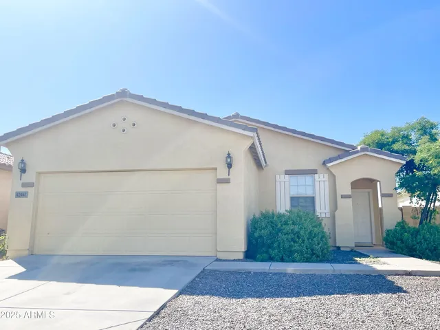 a view of a small space in front of a house