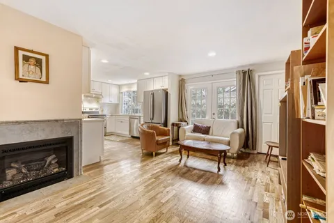 a front view of house with yard and outdoor seating