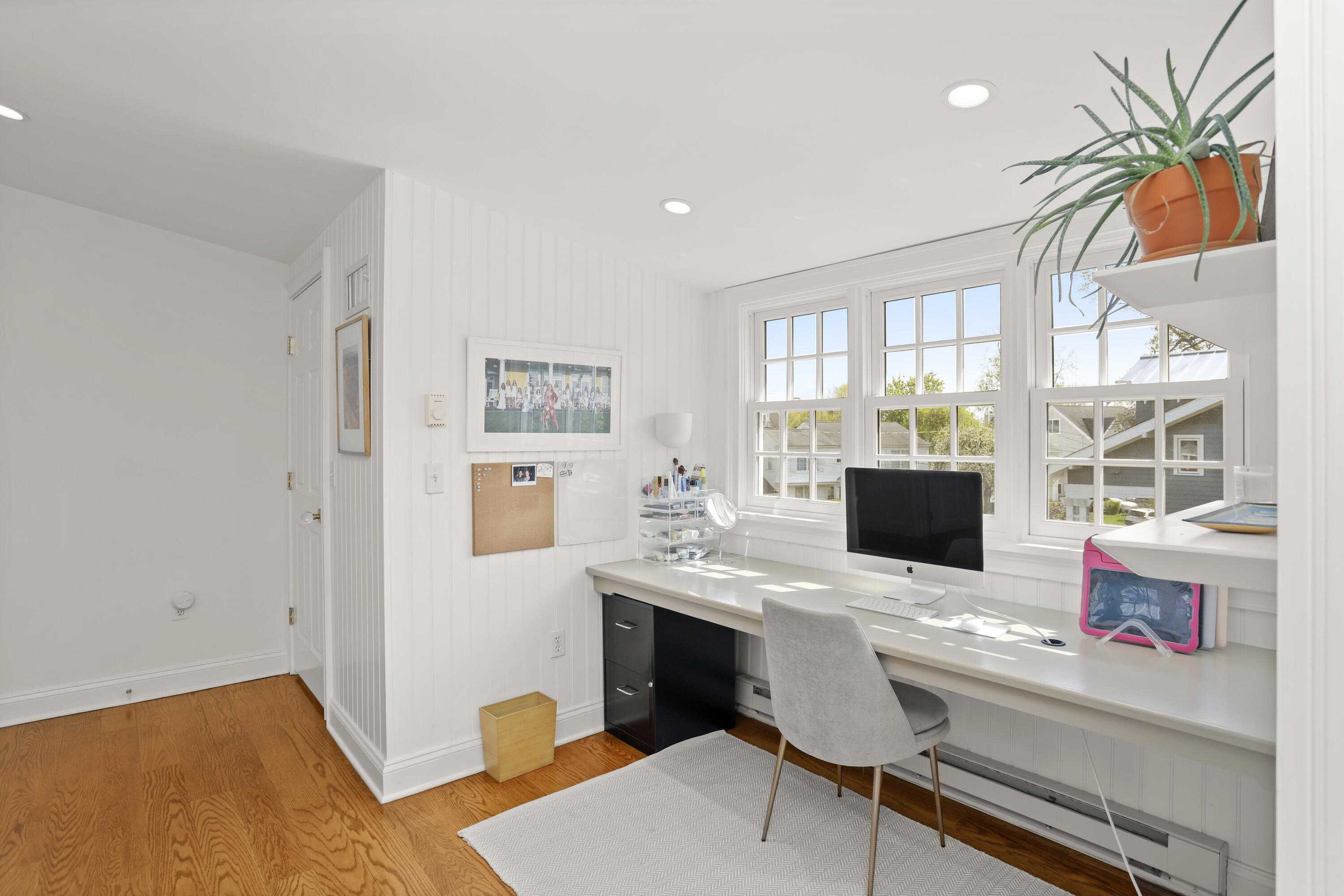 78 Roton Avenue Norwalk, CT 06853 - Photo 18 of 31 a view of a workspace with furniture and a window