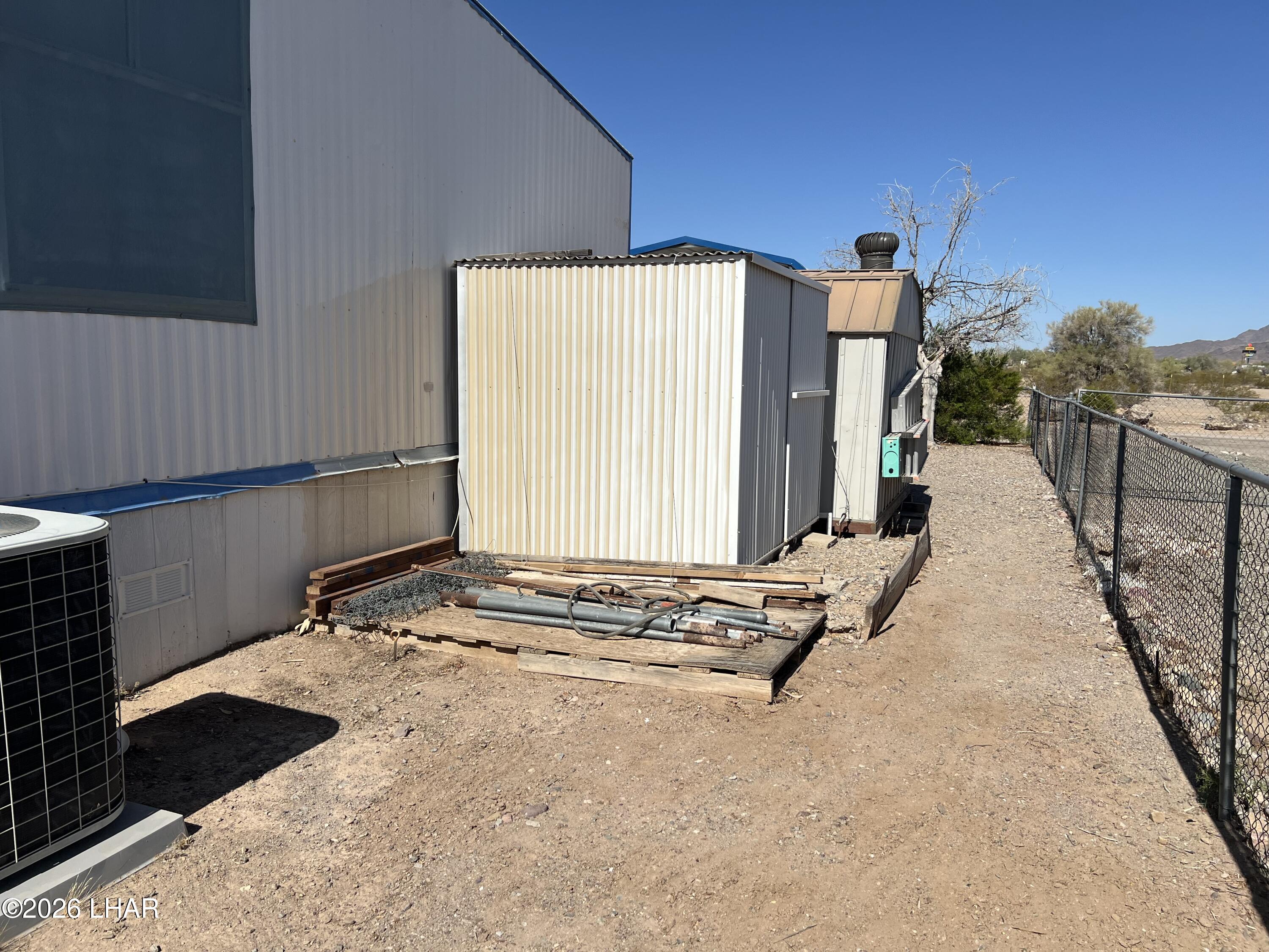 776 Granada Drive Quartzsite, AZ 85346 - Photo 6 of 39 Shed on side of house