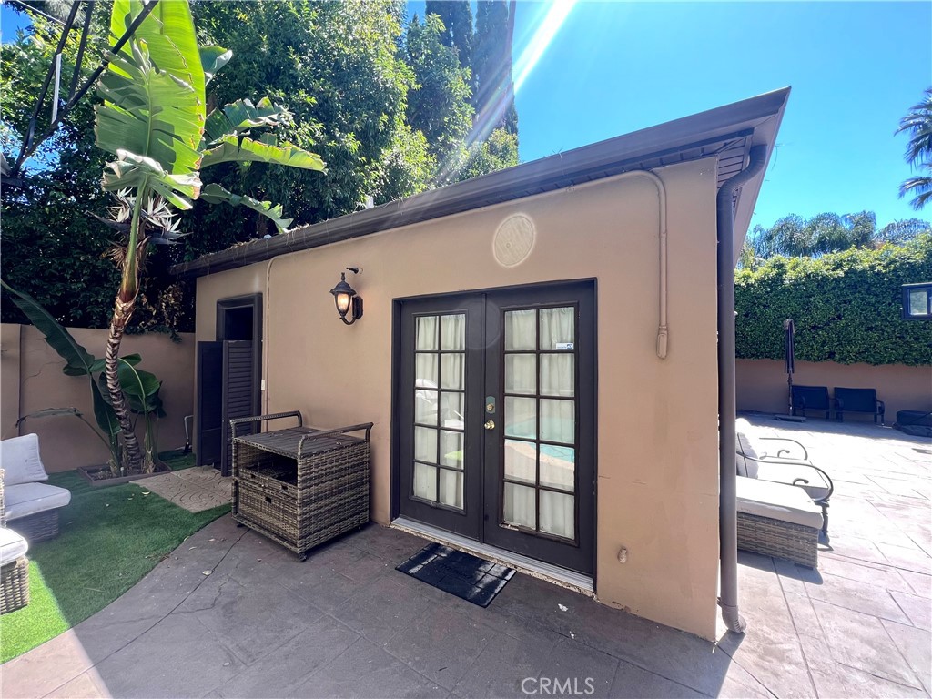 17401 Raymer Street Northridge, CA 91325 - Photo 16 of 19 a view of backyard with deck and outdoor seating