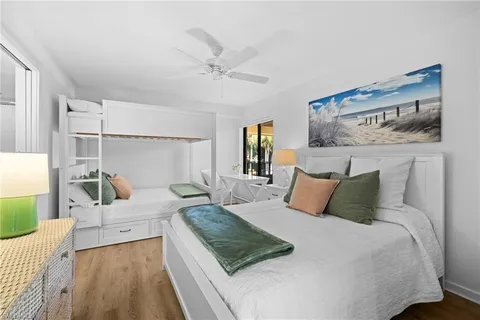 a spacious bathroom with a double vanity sink and mirror