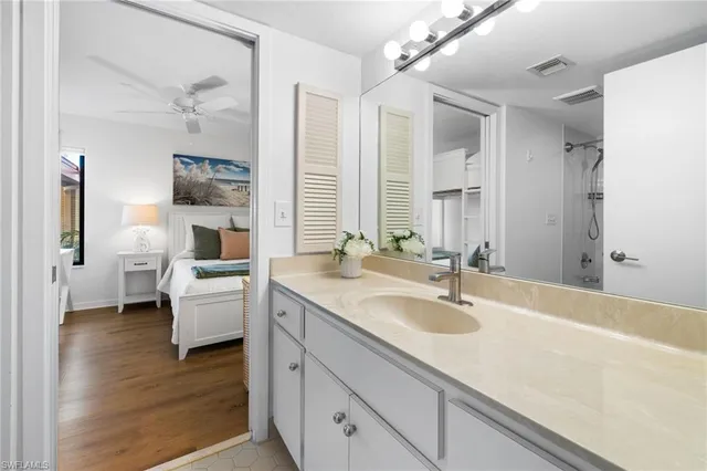 a bathroom with a shower a toilet and a shower