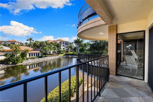 a view of a lake with a city