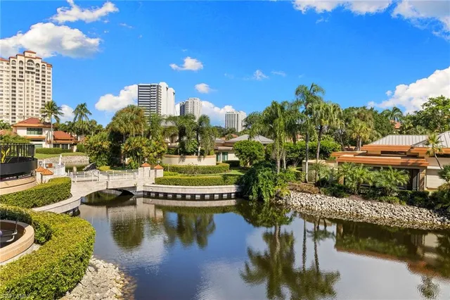 a view of a street with cars