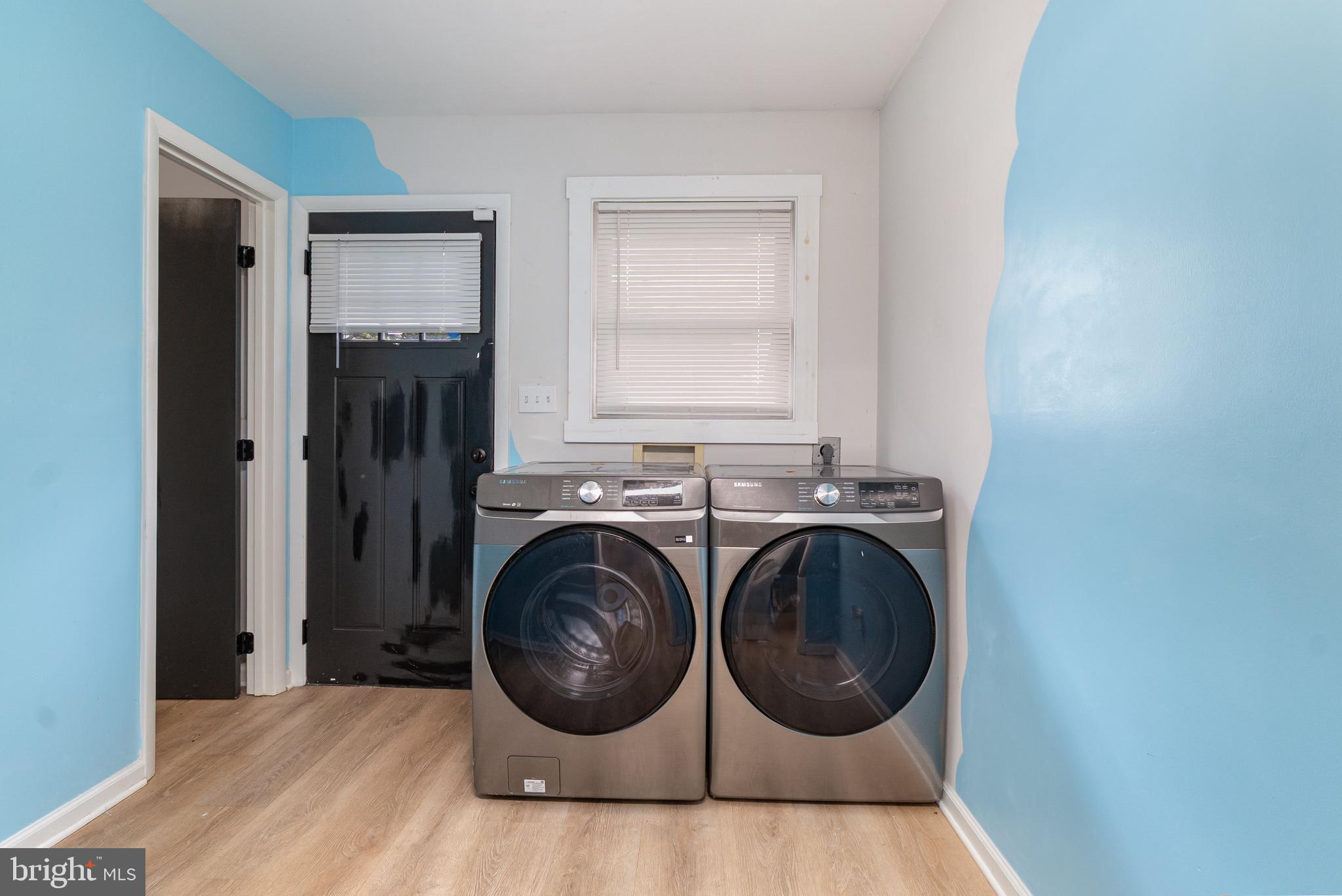 3822 6th Street Baltimore, MD 21225 - Photo 12 of 26 a utility room with dryer and washer