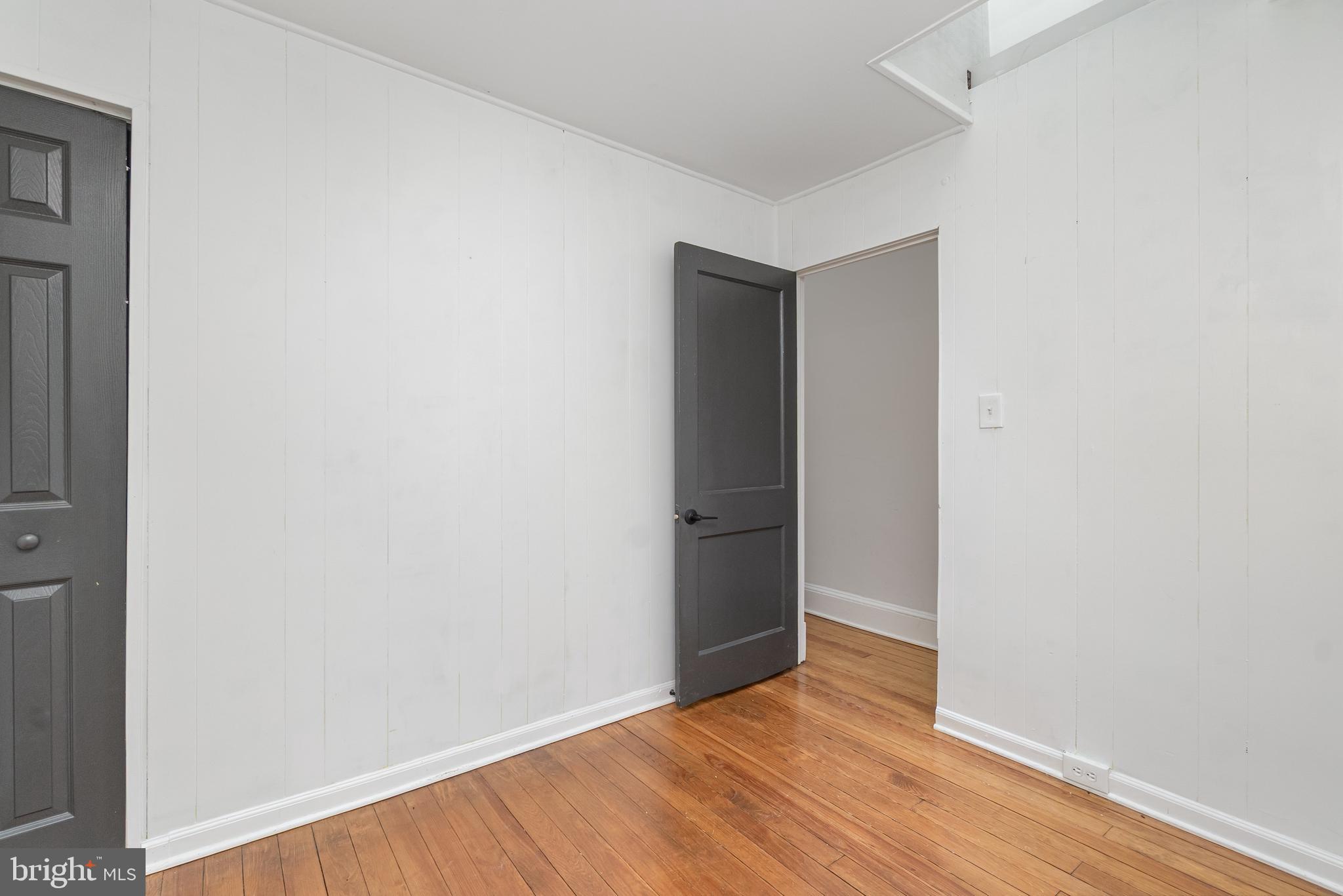 3822 6th Street Baltimore, MD 21225 - Photo 16 of 26 a view of an empty room with wooden floor