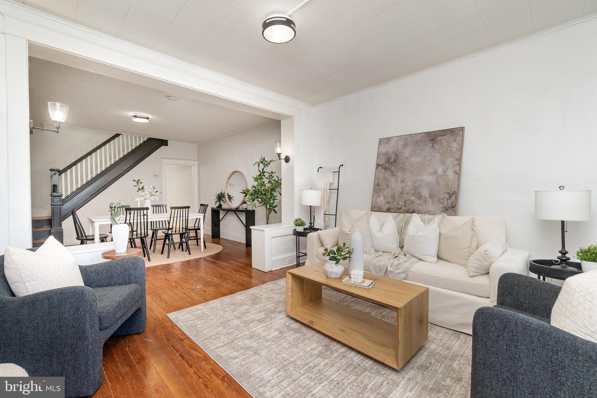 3822 6th Street Baltimore, MD 21225 - Photo 4 of 26 a living room with furniture and wooden floor