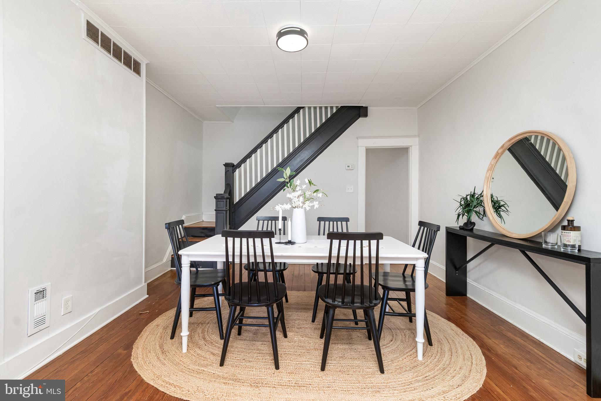 3822 6th Street Baltimore, MD 21225 - Photo 5 of 26 a view of a livingroom with furniture and wooden floor