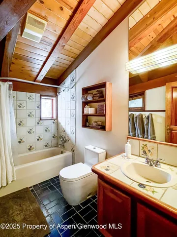 a room with furniture and stairs