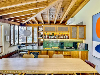 a bedroom with a bed and a fireplace